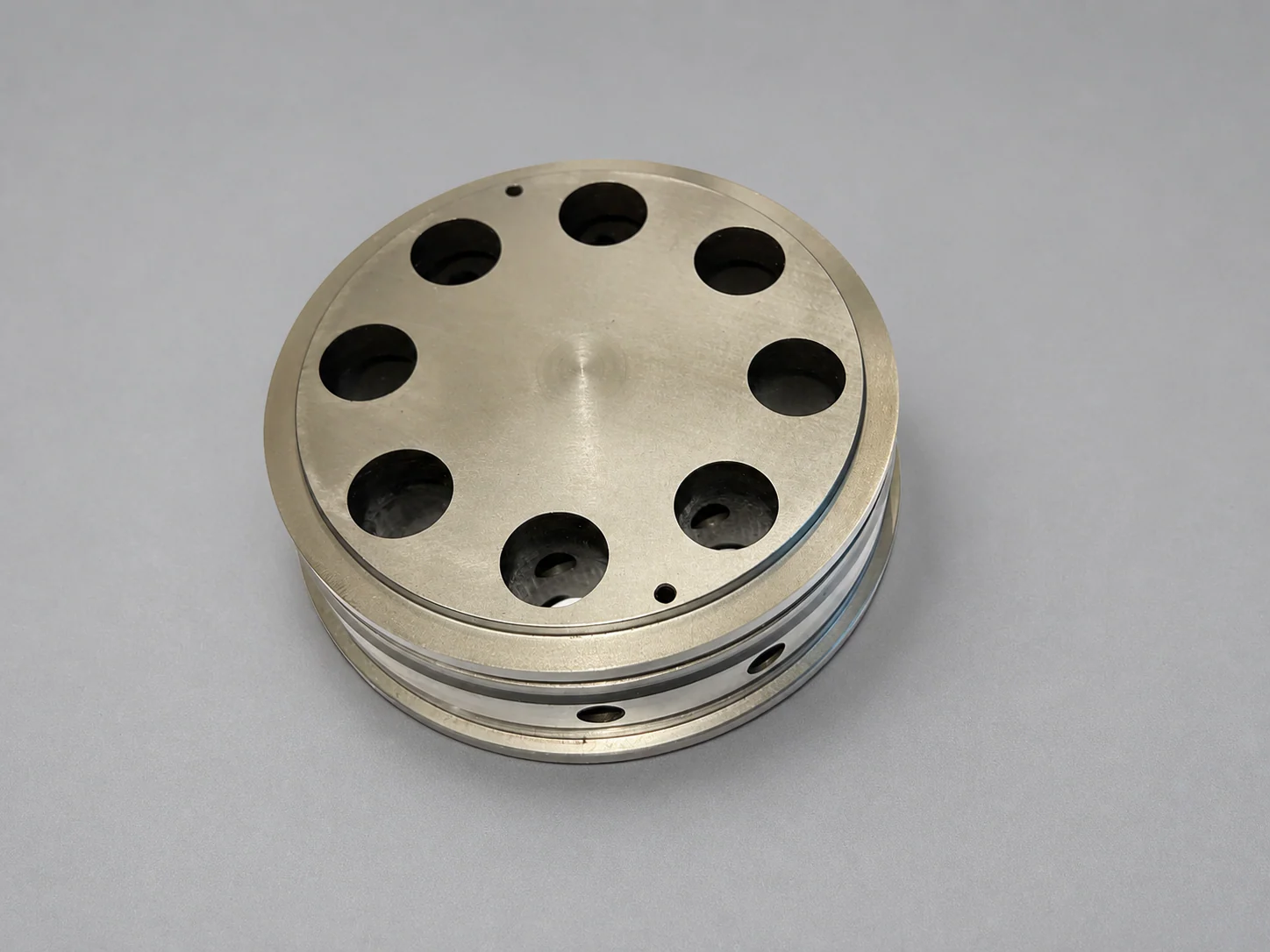 Precision machined mold component from Huicheng company photography, professionally retouched