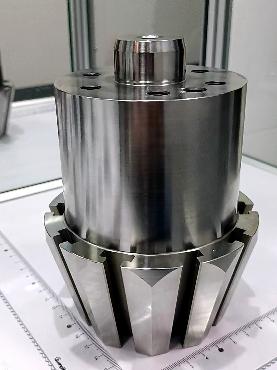 HC Precision-supplied photograph of a cylindrical precision component assembly with interacting surfaces